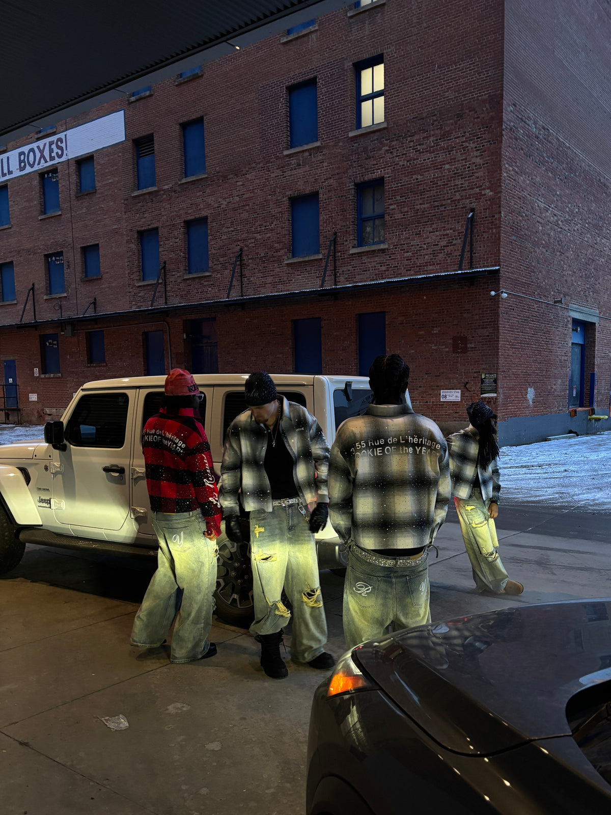 Group wearing Bred and Cool Gray Iced Out Flannels